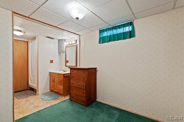 1402 Westhaven Blvd, Tecumseh, MI 49286 - bathroom with a drop ceiling, vanity, and a shower with curtain