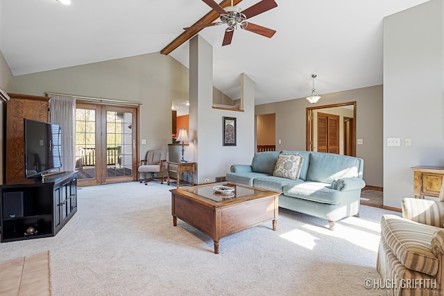 carpeted living area with beam ceiling, ceiling fan, and high vaulted ceiling