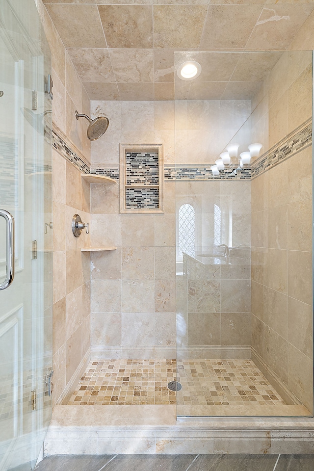 full bath featuring a stall shower
