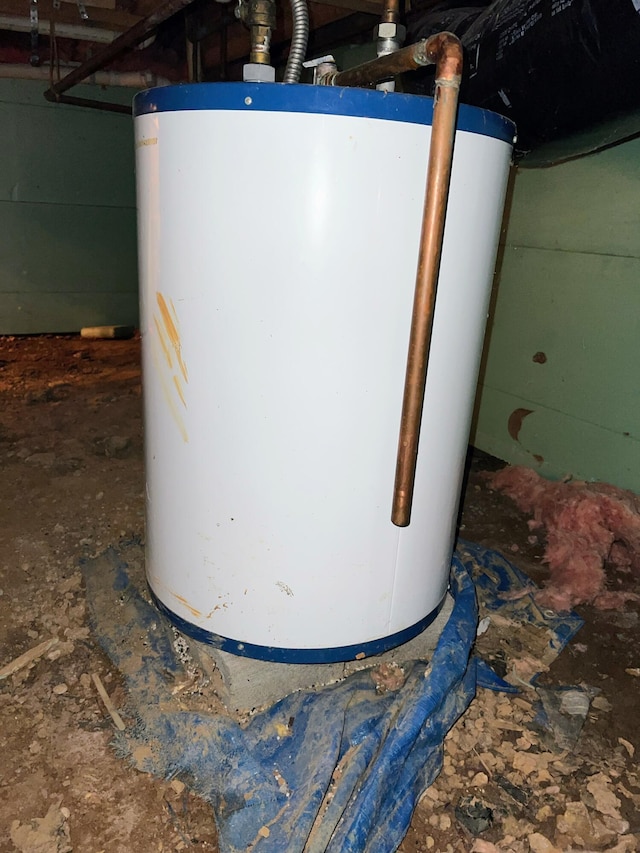 utility room featuring gas water heater