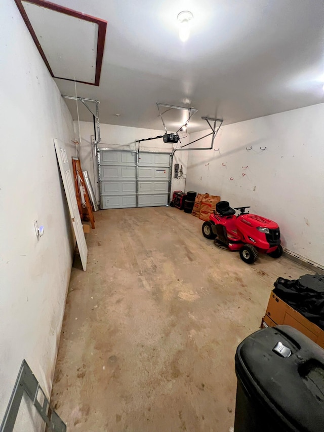 garage featuring a garage door opener
