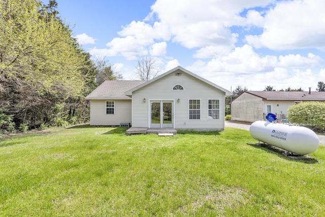 12938 Kelley Rd, Brooklyn, MI 49230 - back of property with a yard and french doors