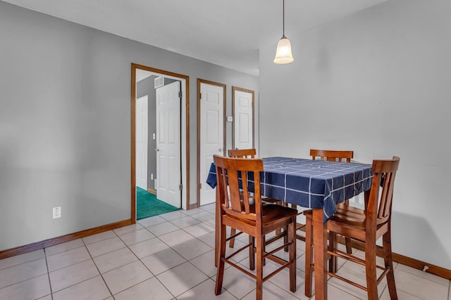 12938 Kelley Rd, Brooklyn, MI 49230 - dining space with baseboards and light tile patterned floors