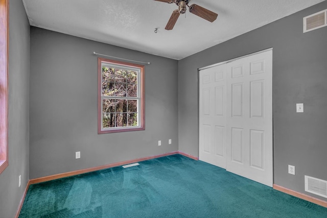 12938 Kelley Rd, Brooklyn, MI 49230 - unfurnished bedroom with carpet, baseboards, and a closet