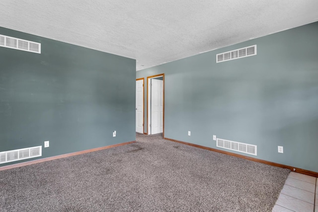12938 Kelley Rd, Brooklyn, MI 49230 - spare room featuring baseboards and a textured ceiling