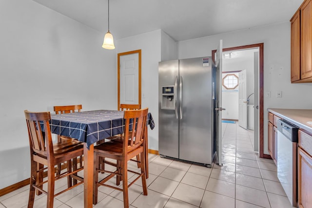 12938 Kelley Rd, Brooklyn, MI 49230 - dining room featuring baseboards and light tile patterned floors