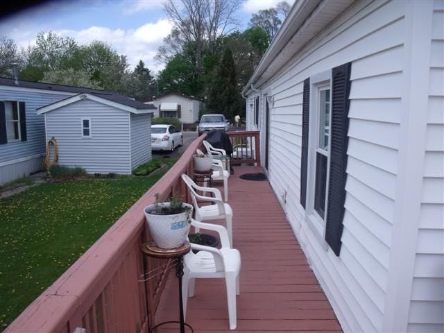 deck featuring a yard