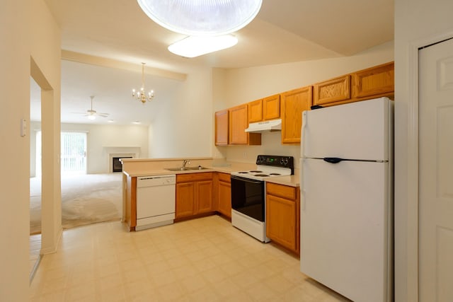 22876 Woodcreek Dr, Taylor, MI 48180 - kitchen with white appliances, a sink, under cabinet range hood, vaulted ceiling, and light countertops