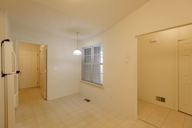 22876 Woodcreek Dr, Taylor, MI 48180 - unfurnished dining area with light flooring and baseboards