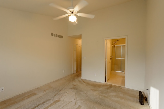 22876 Woodcreek Dr, Taylor, MI 48180 - spare room with ceiling fan, high vaulted ceiling, light carpet, and baseboards