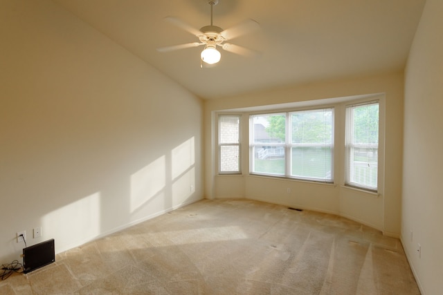 22876 Woodcreek Dr, Taylor, MI 48180 - unfurnished room featuring carpet, a ceiling fan, lofted ceiling, and baseboards