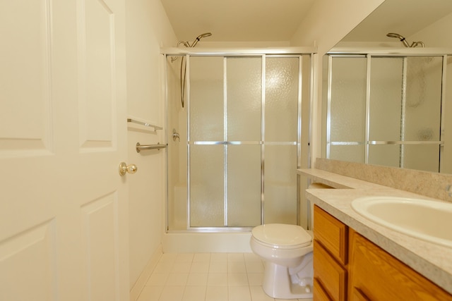 22876 Woodcreek Dr, Taylor, MI 48180 - full bathroom with a stall shower, tile patterned flooring, toilet, and vanity