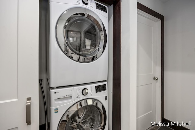 506 Fairview Ave NE, Grand Rapids, MI 49503 - washroom featuring stacked washer and clothes dryer and laundry area