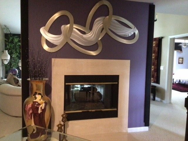 detailed view of a glass covered fireplace