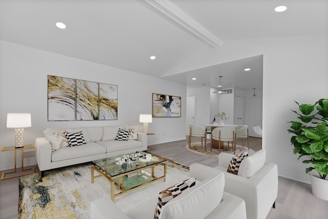 living area featuring recessed lighting, wood finished floors, and vaulted ceiling with beams