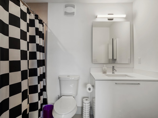 533 E Harrison Ave Unit 12, Royal Oak, MI 48067 - bathroom with curtained shower, vanity, and toilet