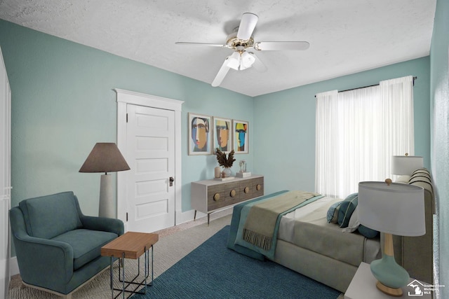 bedroom with carpet floors and a ceiling fan