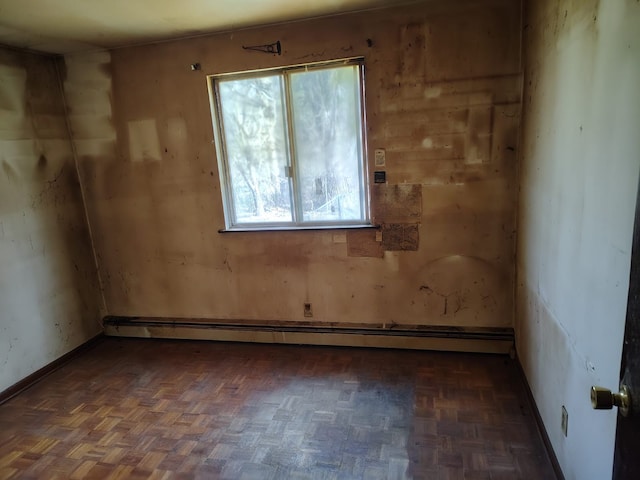 12416 Nichols Rd, Montrose, MI 48457 - spare room featuring baseboards and a baseboard radiator