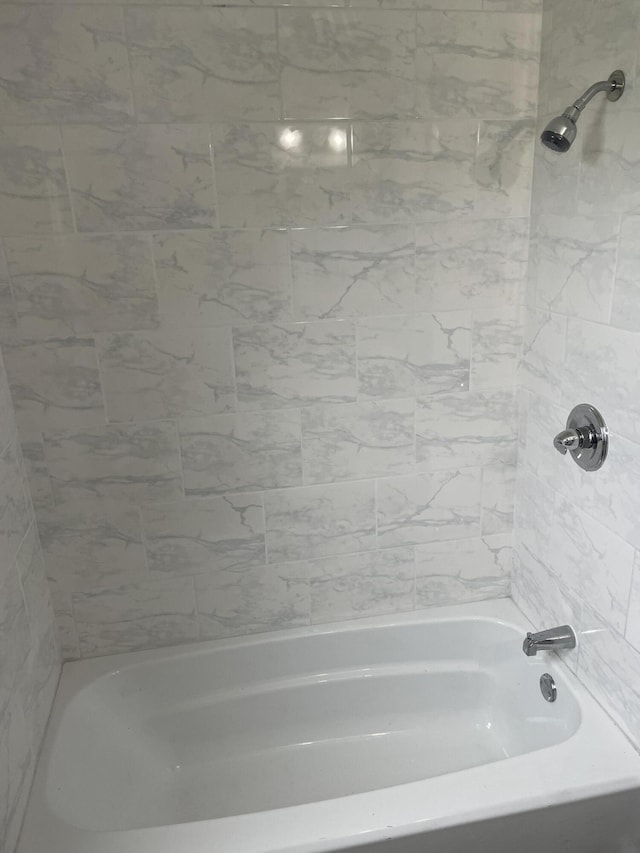 full bathroom with  shower combination