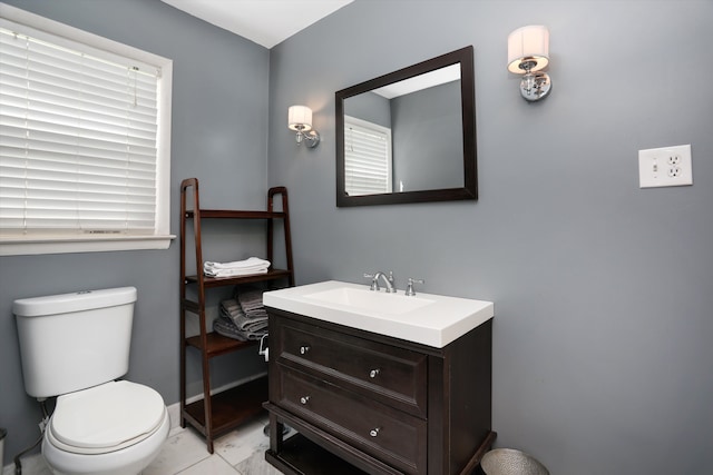 22641 N Nottingham Dr, Beverly Hills, MI 48025 - bathroom featuring toilet, baseboards, and vanity