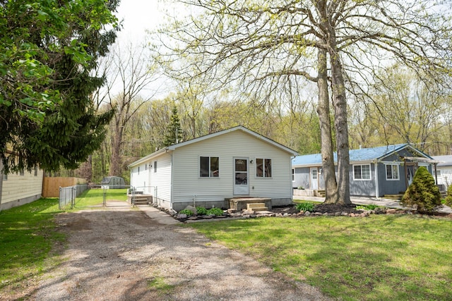 9114 Island Dr, Clay, MI 48001 - view of front facade with a gate and crawl space