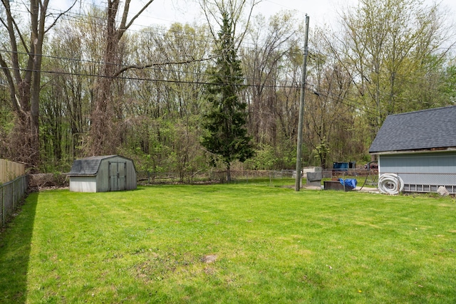 9114 Island Dr, Clay, MI 48001 - view of yard featuring a storage shed and an outdoor structure