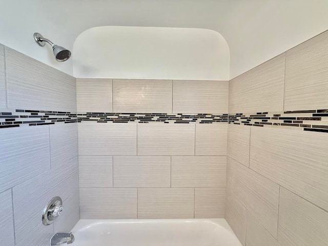 bathroom featuring bathing tub / shower combination