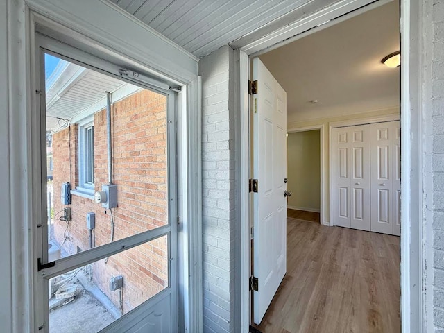 hallway featuring wood finished floors