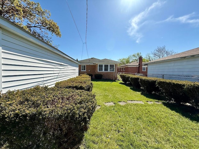 view of yard featuring fence
