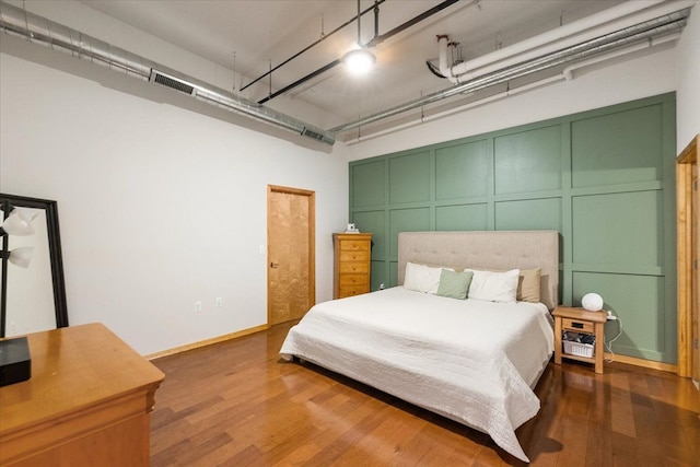 444 W Willis St Unit 204, Detroit, MI 48201 - bedroom featuring wood finished floors and ceiling fan
