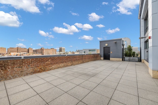444 W Willis St Unit 204, Detroit, MI 48201 - view of patio with a city view and fence