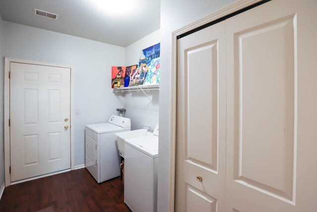 47951 Cardiff Ave Unit 118, Canton, MI 48188 - laundry area featuring dark wood-type flooring and washing machine and dryer