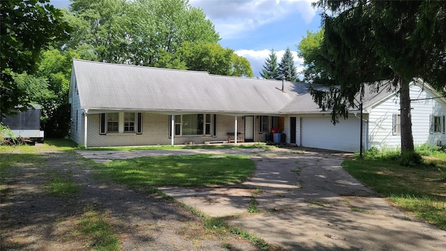 6225 Farmington Rd, West Bloomfield, MI 48322 - ranch-style home with driveway, a porch, brick siding, and a garage