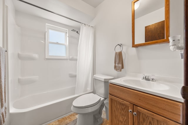 bathroom featuring toilet, shower / bath combo, and vanity
