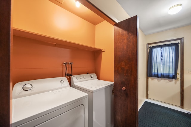 washroom with laundry area and washer and dryer