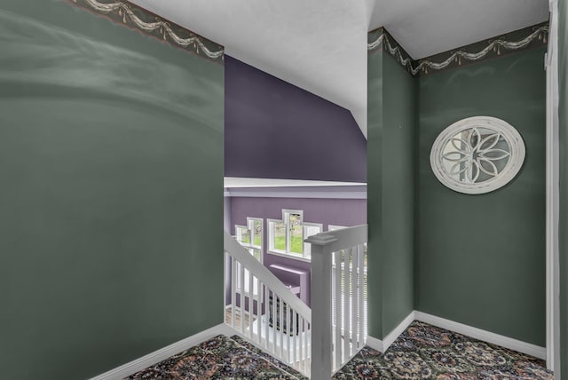 stairs featuring baseboards