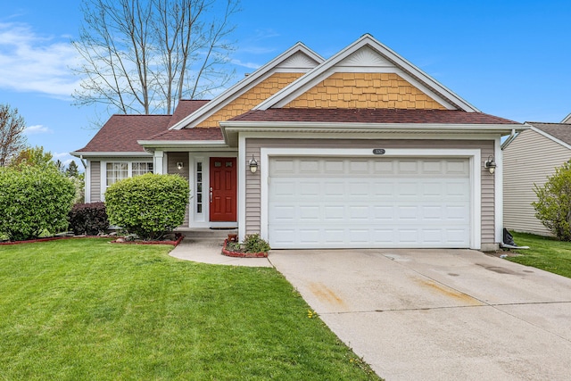 view of front of home featuring concrete driveway, a garage, roof with shingles, and a front lawn