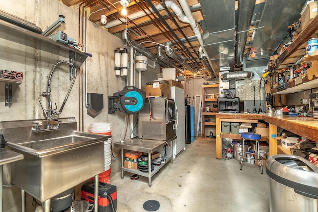 unfinished basement with a workshop area