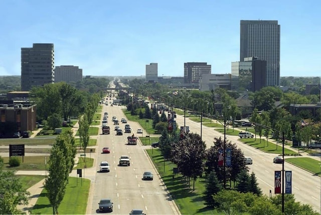 birds eye view of property featuring a city view