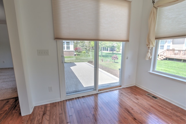 24179 Charlevoix St, Flat Rock, MI 48134 - entryway featuring wood-type flooring and baseboards