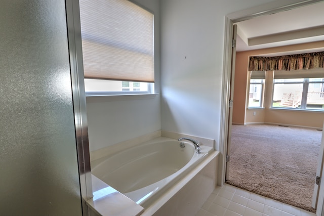 24179 Charlevoix St, Flat Rock, MI 48134 - full bathroom featuring a garden tub and tile patterned flooring