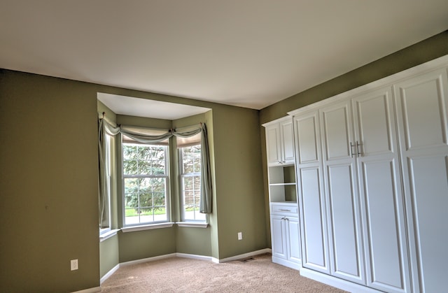 24179 Charlevoix St, Flat Rock, MI 48134 - unfurnished bedroom with light carpet and baseboards