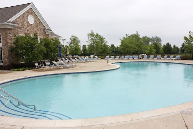24179 Charlevoix St, Flat Rock, MI 48134 - community pool featuring a patio