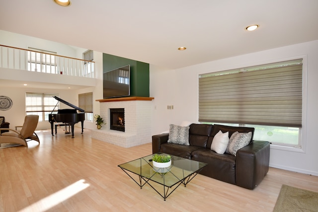 5100 Kings Gate Way, Bloomfield Hills, MI 48302 - living area with wood finished floors, a brick fireplace, and recessed lighting
