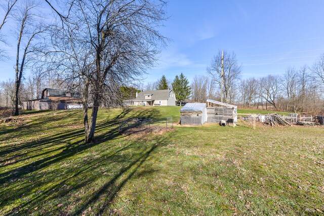 4780 Dutcher Rd, Howell, MI 48843 - view of yard featuring an outdoor structure