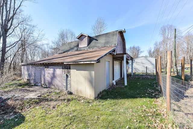 4780 Dutcher Rd, Howell, MI 48843 - view of home's exterior featuring a yard and fence