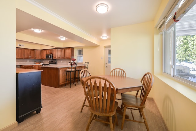 4780 Dutcher Rd, Howell, MI 48843 - dining space featuring light wood finished floors