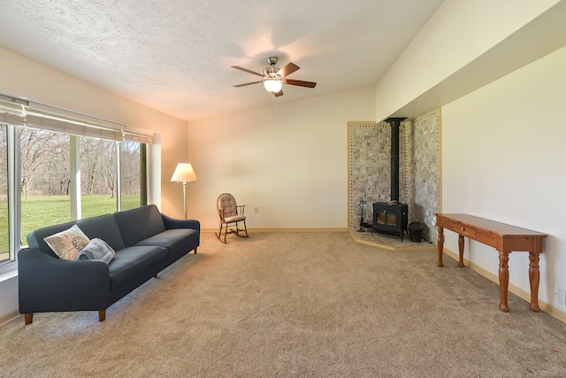 4780 Dutcher Rd, Howell, MI 48843 - living room featuring carpet flooring, plenty of natural light, baseboards, and ceiling fan