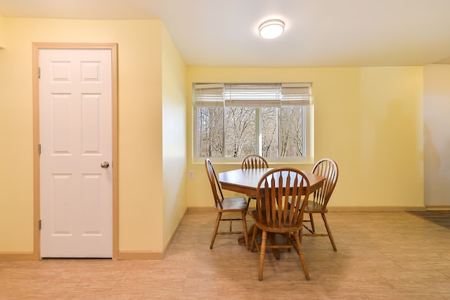 4780 Dutcher Rd, Howell, MI 48843 - dining room featuring baseboards