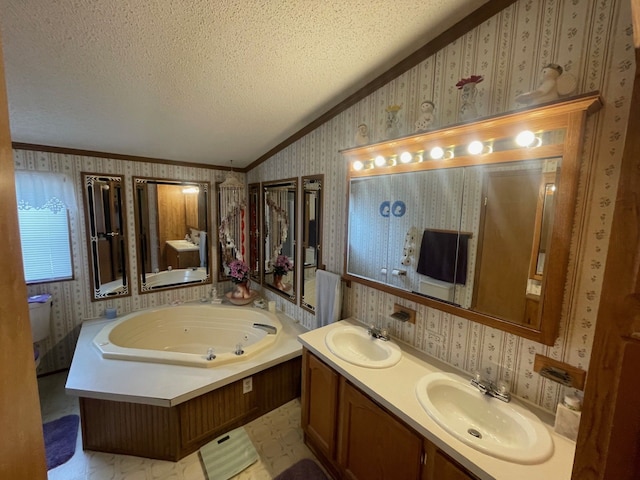 bathroom featuring wallpapered walls, ornamental molding, a textured ceiling, a jetted tub, and lofted ceiling